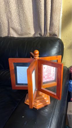 Wood revolving picture frame