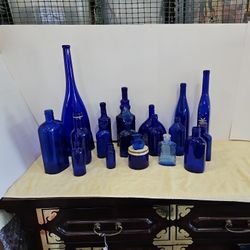 Eighteen (18) Blue Glass Bottles