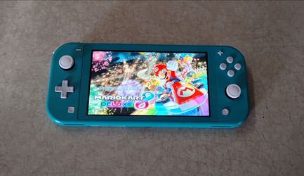 NINTENDO SWITCH LITE + 50 SWITCH GAMES
