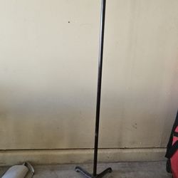 2 freestanding industrial T-bar clothing rack