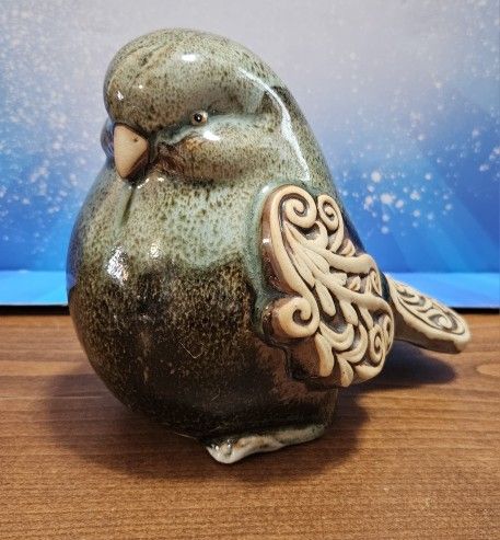 Green pottery bird scroll wings and tail darker glaze on wings tail
