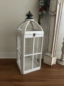 Decorative wooden lantern, white, 26” high, 10.5” wide, 10.5” deep. New. Bottom price $50.00.