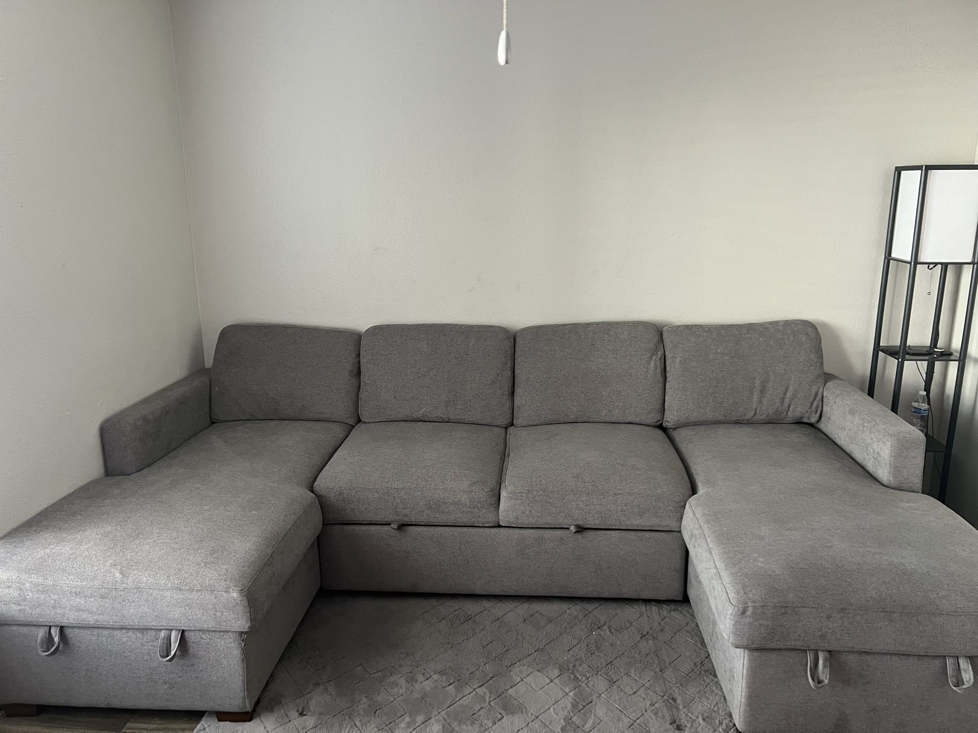 Grey Couch With A Pull Out