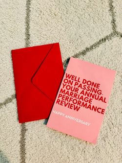 Funny anniversary card with red text on pink background