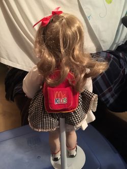 McDonald's doll with back pack on stand