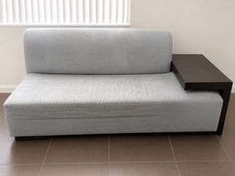 Modern sofa with built inside table