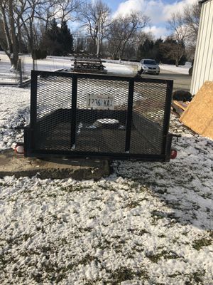 Photo 5x8 Utility trailer with fold down gate