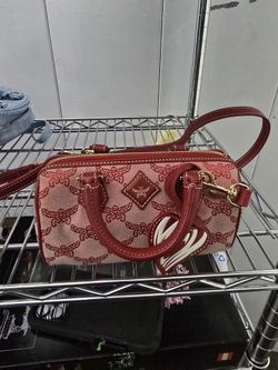 MCM Lauretos Boston bag is crafted from monogram jacquard