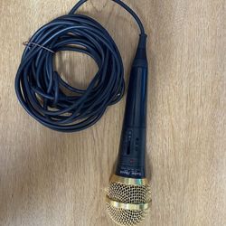 Vintage karaoke Echo microphone RadioShack 33–3006 gold version