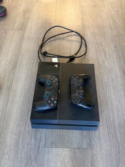 Sony PS4 Console with Two Controllers and Power Cable