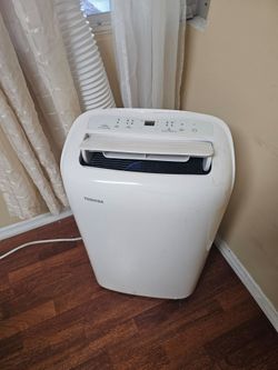 AC PORTABLE TOSHIBA 6000 BTU IS TOUCH SCREEN, SLEEP TIMER, MODE,WORKS GREAT YOU CAN TEST IT BEFORE PURCHASE FOR ANY QUESTION TEXT ME PLEASE