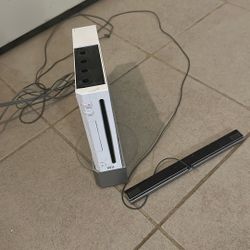 Wii + Remotes + Games