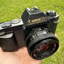 Canon T50 + 50mm 1.8  35mm film slr camera