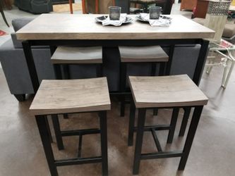 Grey counter height table with 4 stools