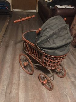 Antique baby doll stroller.... vintage wooden carriage