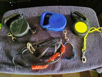 Retractable dog leashes. $1 each