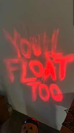 Gemmy projector , moving floating words from the movie IT