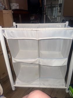 Preowned Munchkin Diaper Organizer for nursery (tear on top organizer ) located off lake mead and Simmons area asking $12