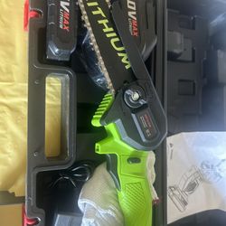 New 6 inch lithium chainsaw air comes with two batteries, safety glasses, and safety gloves