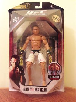 Ufc series 1 bj penn with a manufacturer error. It came with a rich Franklin cover. Never been opened.