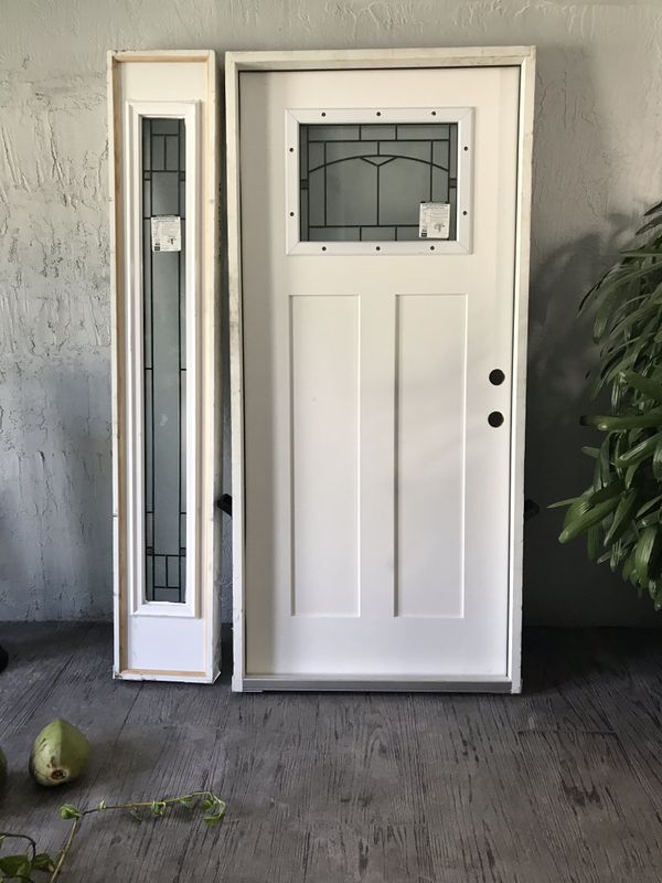 IMPACT RESISTANT FRONT DOOR WITH SIDE LIGHT PANEL for Sale in Hialeah
