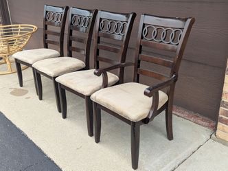 set of 4 heavy solid wood dining room chairs