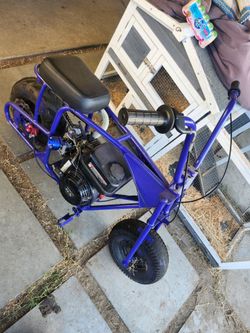 Minibike, new throttle, new tall handlebar rizers, new brake system, new sprocket, new spark plug