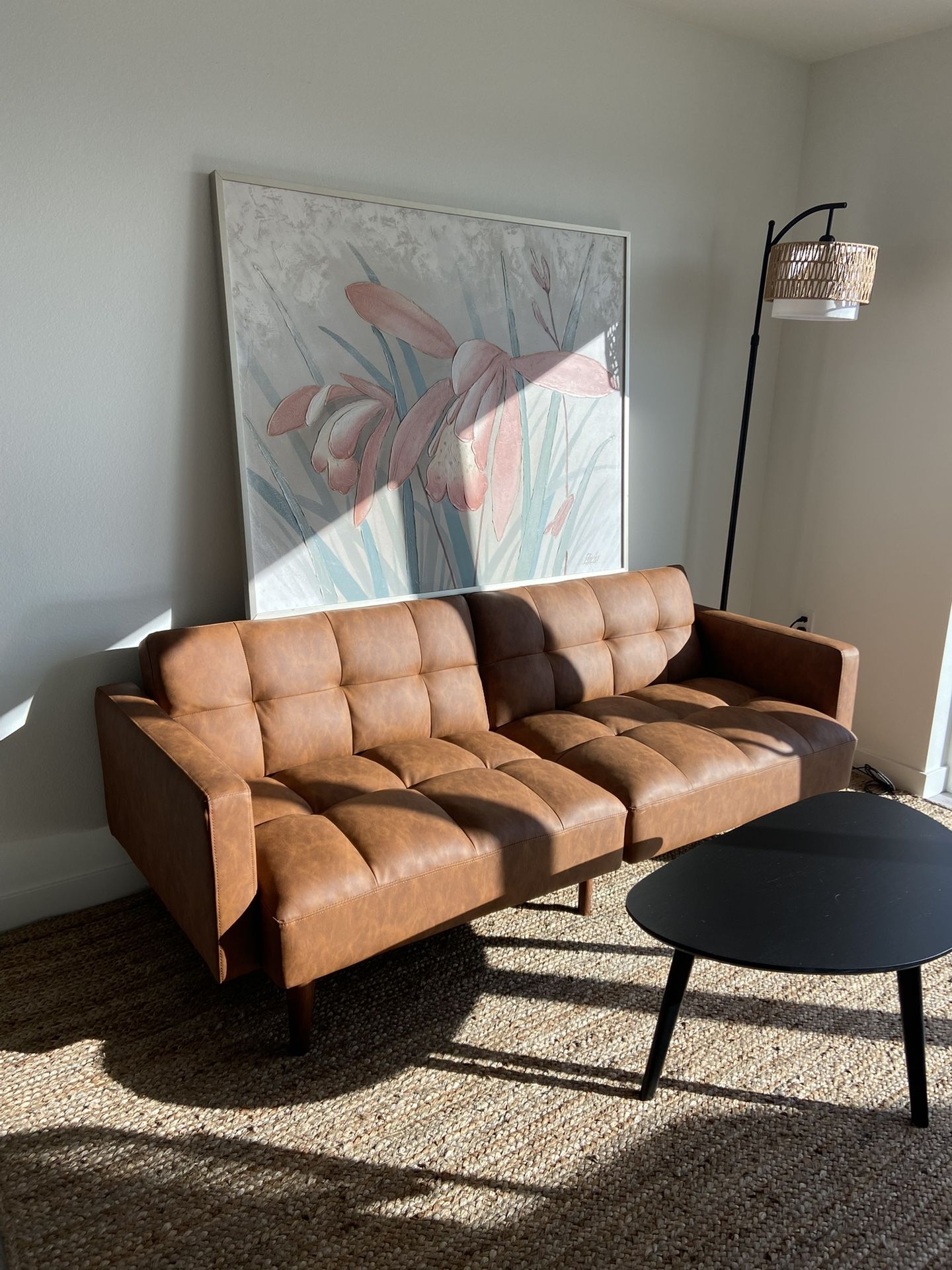 Faux tanned leather sofa bed