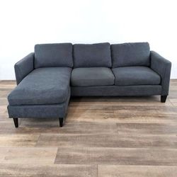 Dark Gray Modern Sectional Sofa with Reversible Chaise from Living Spaces
