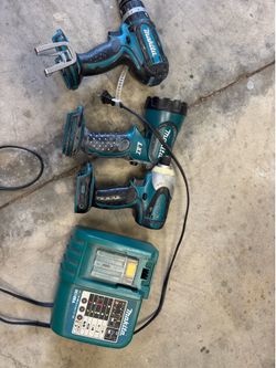 Older Makita cordless drill light set
