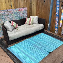 Couch With Pillows And Rug 