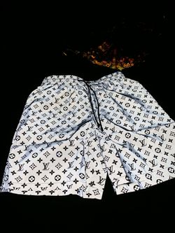 Louis Vuitton reflective monogram shorts/trunks (same shorts in