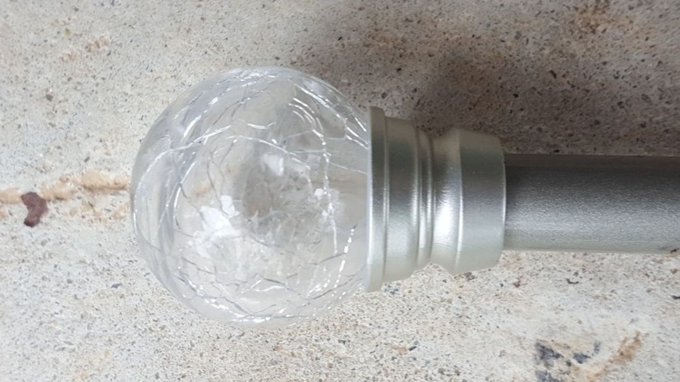 Metal Curtain Rod That Extends Up To Six Foot With Glass Balls On The End