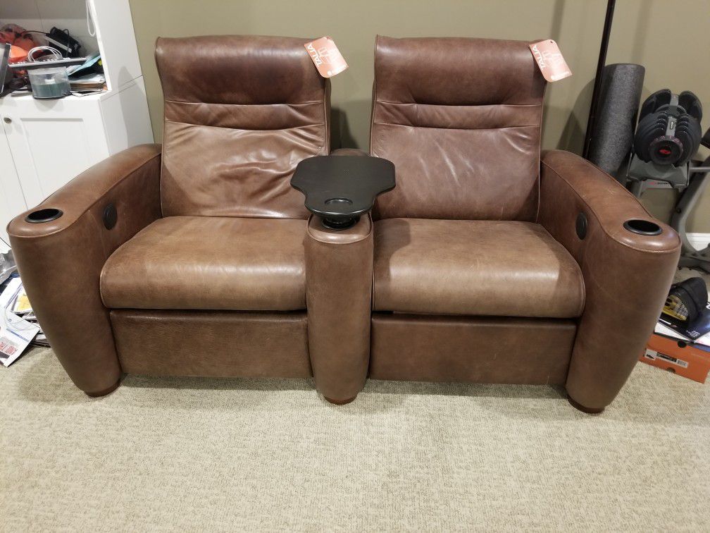Home theater seating motorized recliner