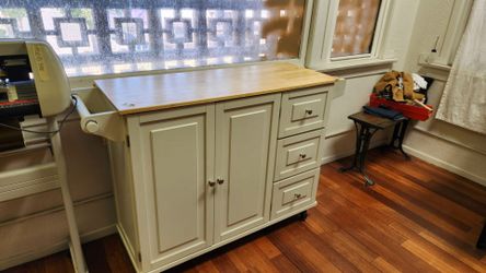 White rolling kitchen island / buffet table