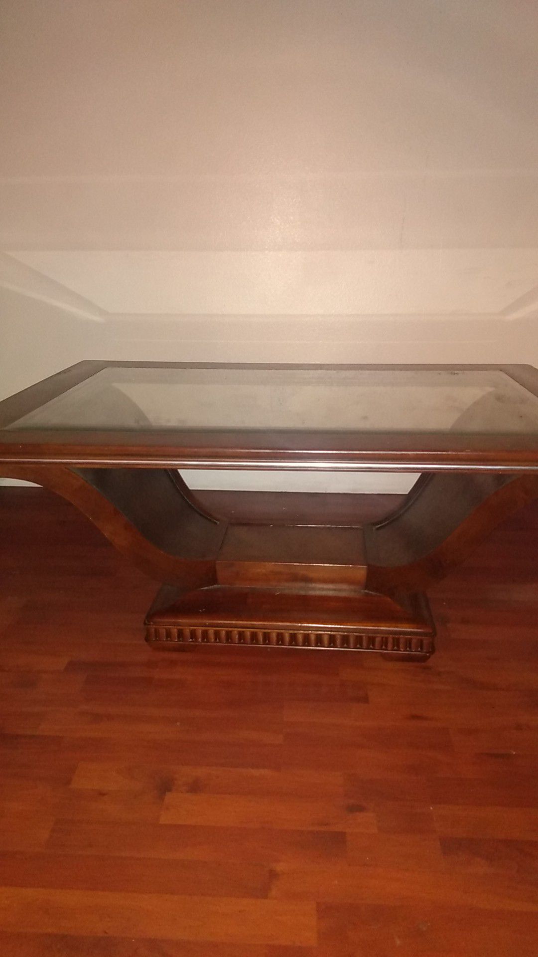 Coffee table with glass top I will Mark sold as soon as somebody picks it up if it is not marked sold it is still available