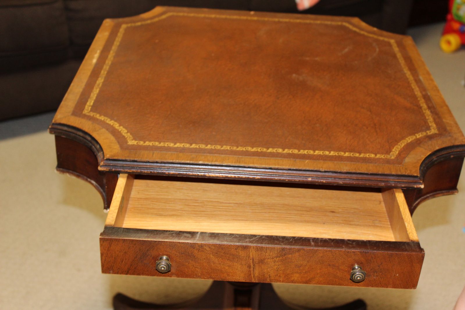 Antique leathertop table