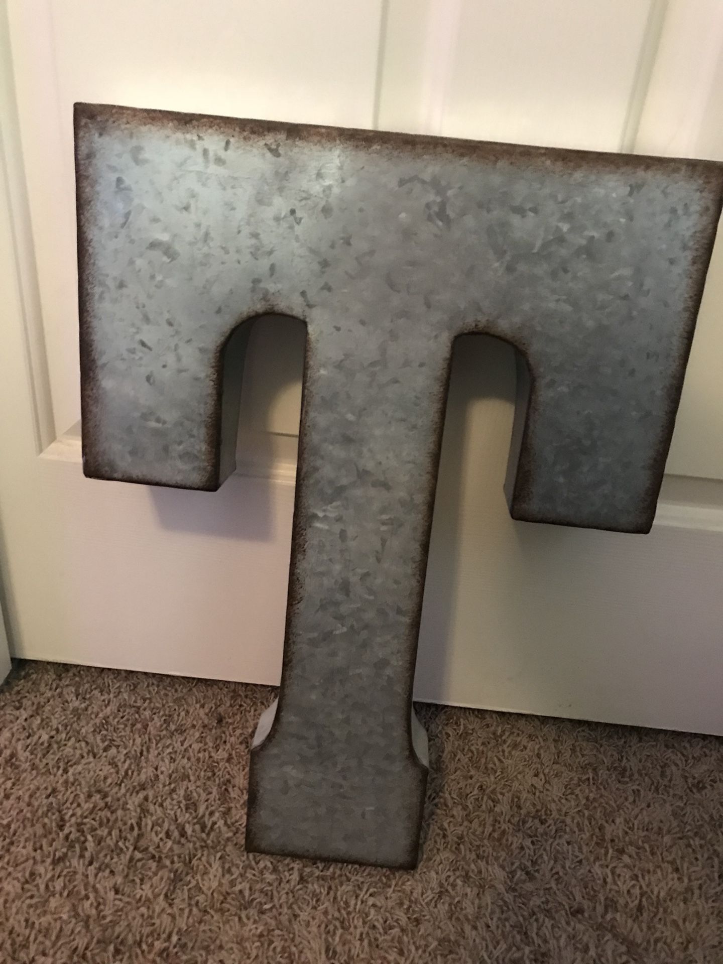 Metal letter T