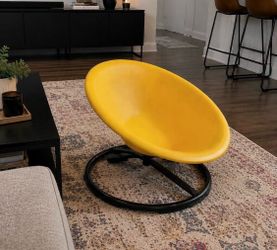 Yellow spinning sensory chair