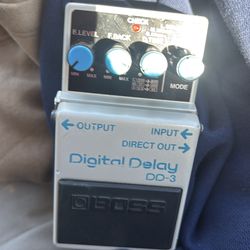 Boss DD-3 Digital Delay guitar effects pedal.