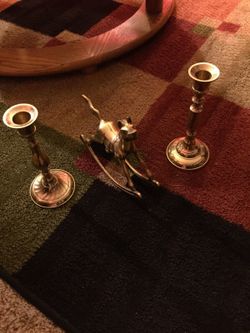 Two candle holder gold color with matching horse