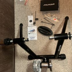 Alpcour fluid bicycle training stand