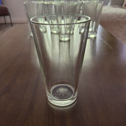10 tall drinking glasses, in good condition