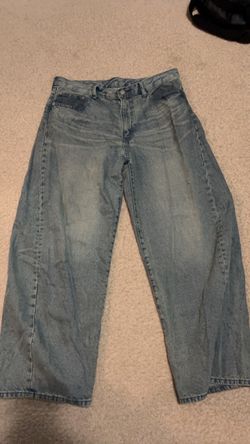 barrel leg baggy blue jeans