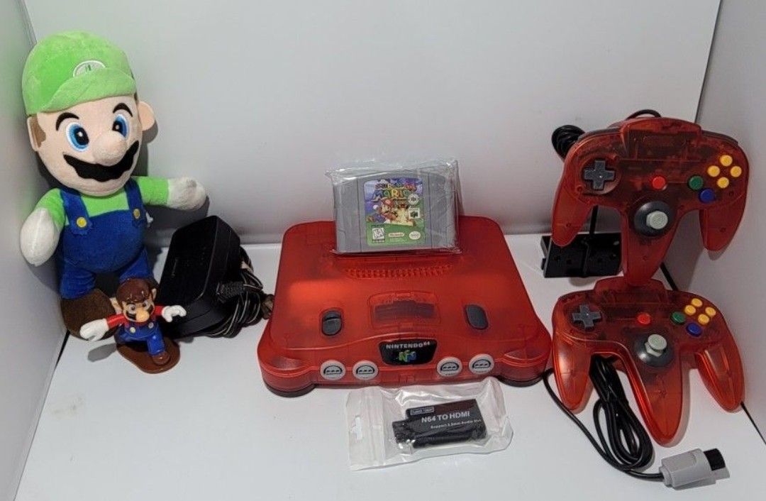 Clear Red Nintendo 64 With Super Mario Game