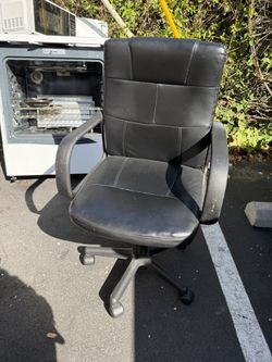 Small black vinyl office chair