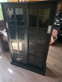 Black Wood Cabinet with Sliding Glass Doors