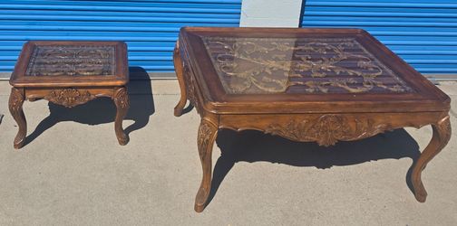 Hand carved tables with glass top set