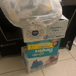Halo Bassinet Crib , Baby Clothes , Box Of Pampers And Wipes 