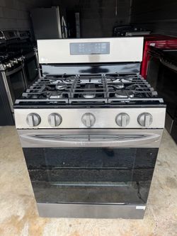 Gas stove. Estufa de gas